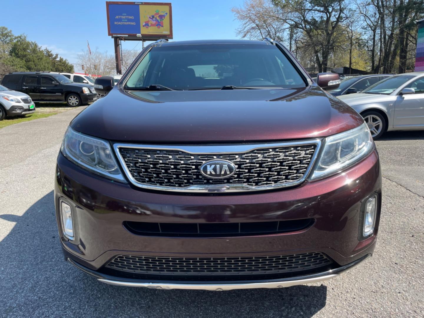 2015 PLUM KIA SORENTO SX (5XYKW4A77FG) with an 3.3L engine, Automatic transmission, located at 5103 Dorchester Rd., Charleston, SC, 29418-5607, (843) 767-1122, 36.245171, -115.228050 - Local Trade-in with Leather, Panoramic Sunroof, Navigation, Backup Camera, CD/AUX/Sat/Bluetooth, Dual Climate Control, Power Everything (windows, locks, seats, mirrors), Heated/Cooled/Memory Seating, Power Liftgate, Convenient Third Row, Push Button Start, Keyless Entry, Alloy Wheels. Certified One - Photo#1